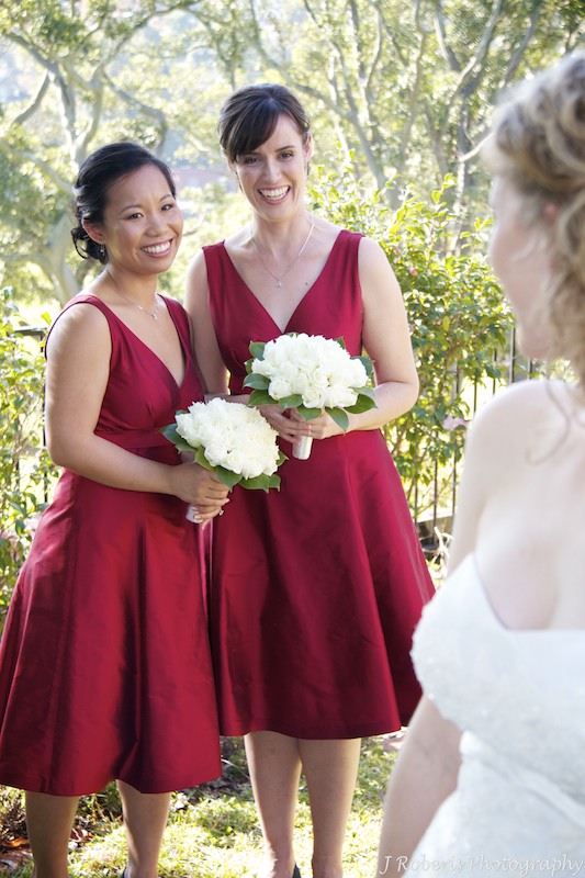 Bridesmaids smiling at the bride - wedding photography sydney